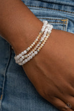 Load image into Gallery viewer, Paparazzi How Does Your Garden GLOW - White Bracelet
