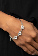 Load image into Gallery viewer, Little Heartbreaker - White Heart Bracelet Paparazzi

