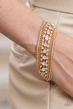 Load image into Gallery viewer, Paparazzi Interstellar Interlude - Gold Bracelet
