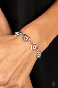 Paparazzi Catching Feelings - Rhinestone Heart Bracelet